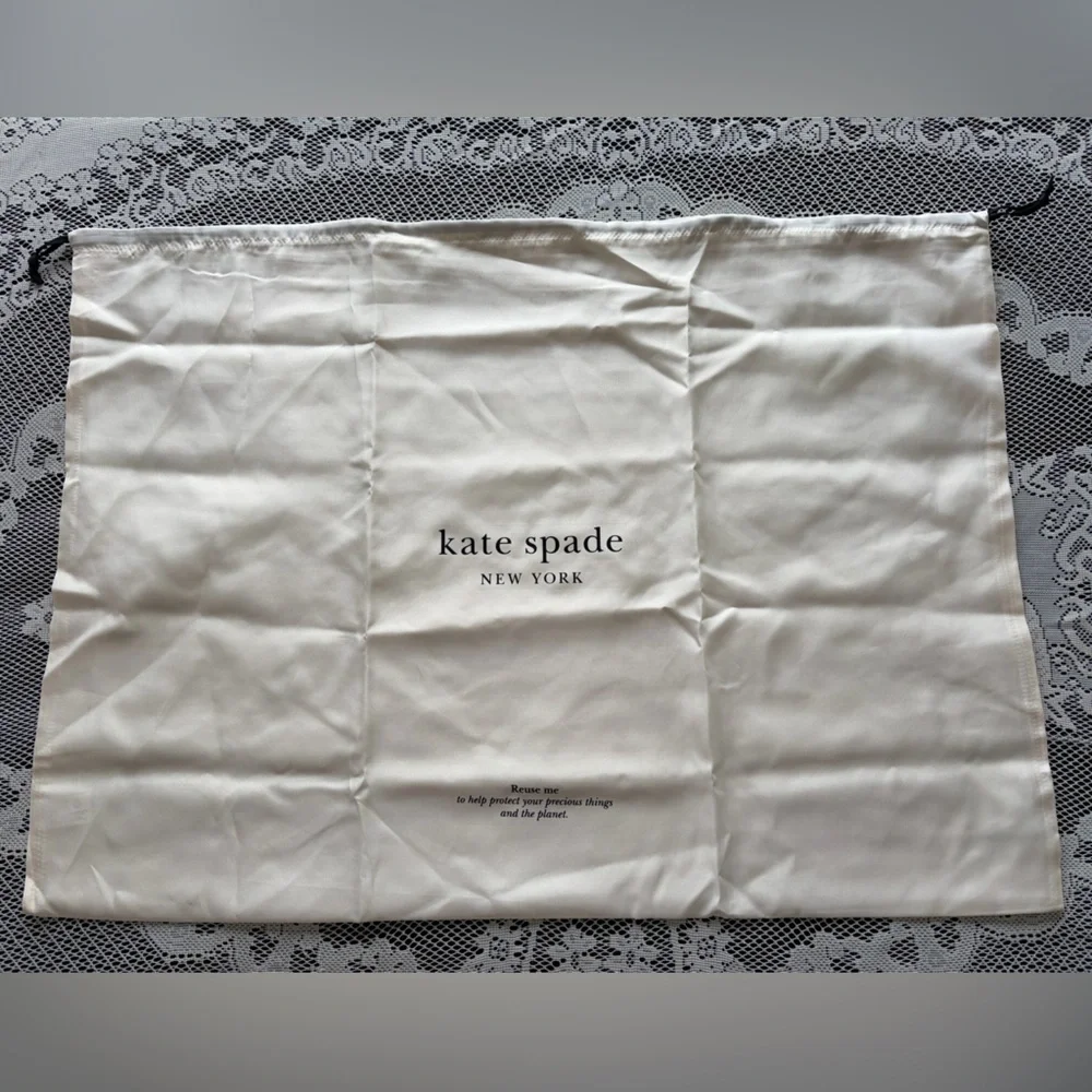 kate spade Cream Drawstring Dust Bag with Black Ties